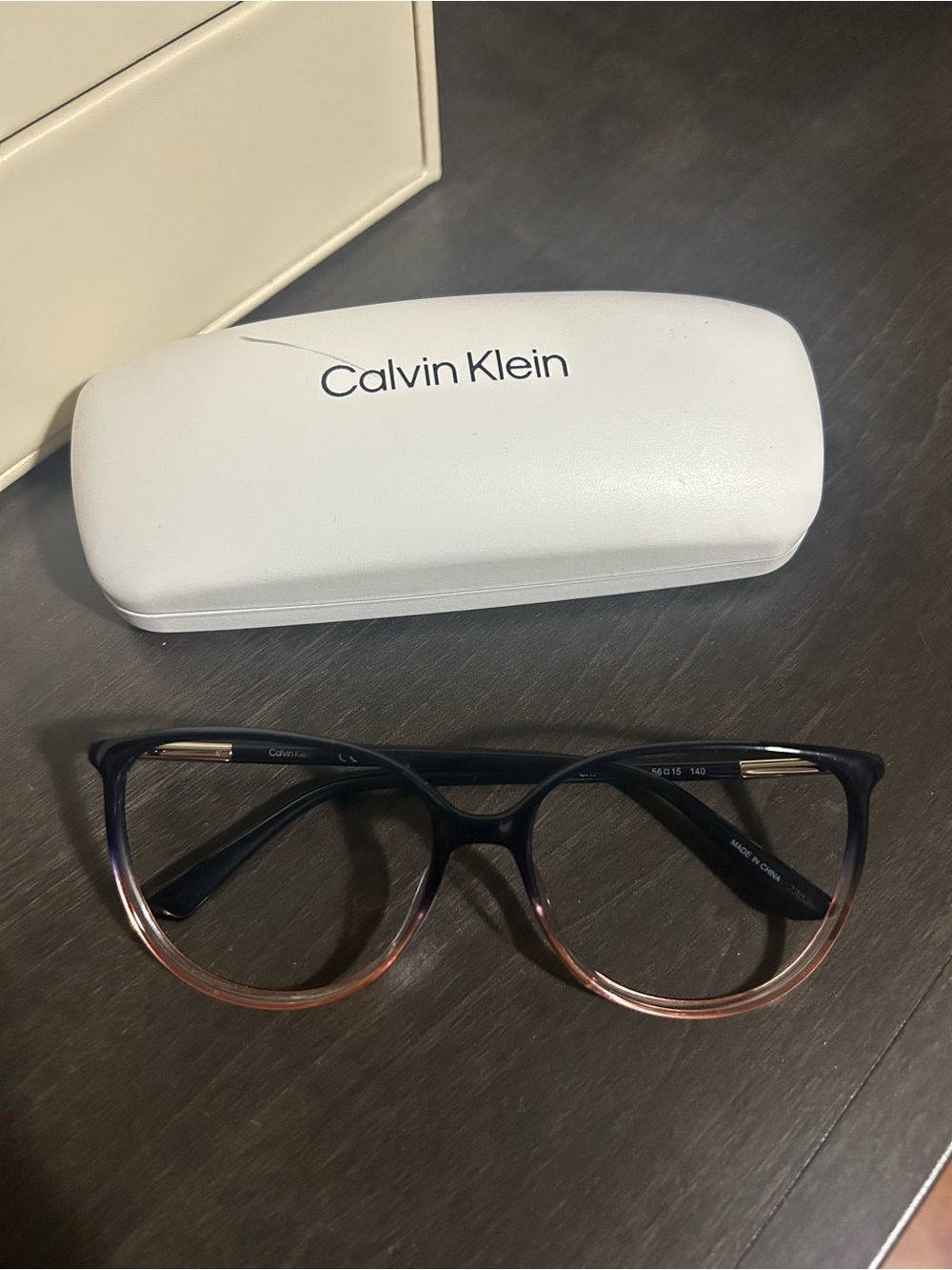 Calvin Klein Navy to Orange Gradient Cat-Eye Glasses